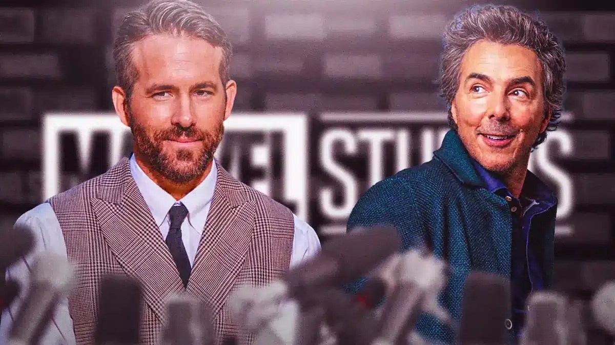 Ryan Reynolds and Shawn Levy with a Marvel Studios logo behind them.