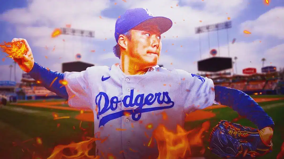 Dodgers' Yoshinobu Yamamoto pitching a baseball with fire coming off the ball at Dodger Stadium.