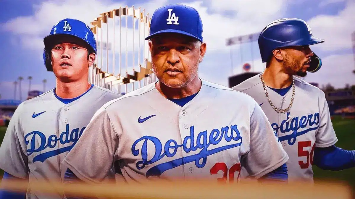 Dodgers Shohei Ohtani alongside Dave Roberts and Mookie Betts with the World Series trophy