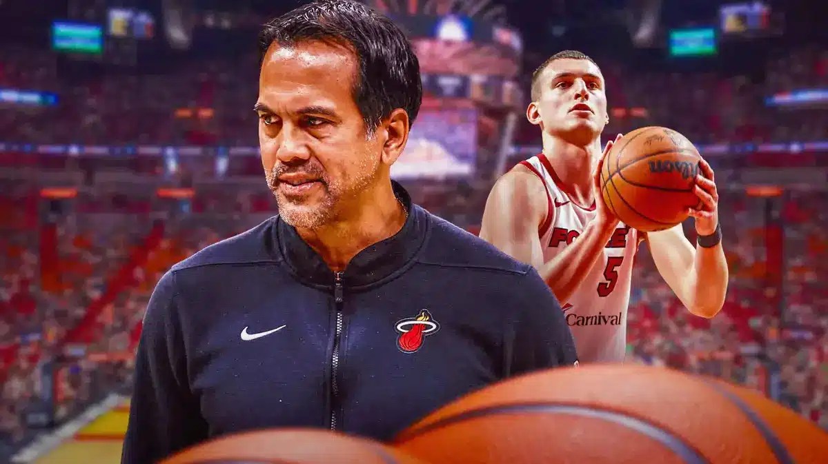 Miami Heat head coach Erik Spoelstra and Nikola Jovic in front of the Kaseya Center.