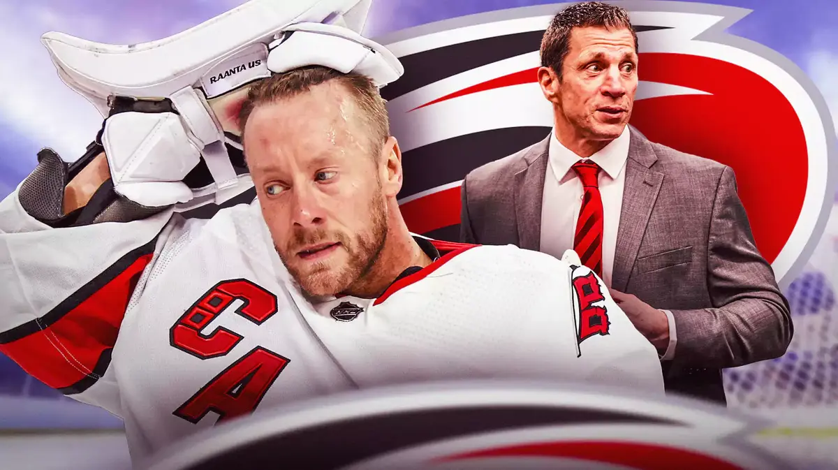 Antti Raanta in middle of image with fire around him looking happy, Rod Brind’Amour also in image, CAR Hurricanes logo, hockey rink in background NHL Power Rankings