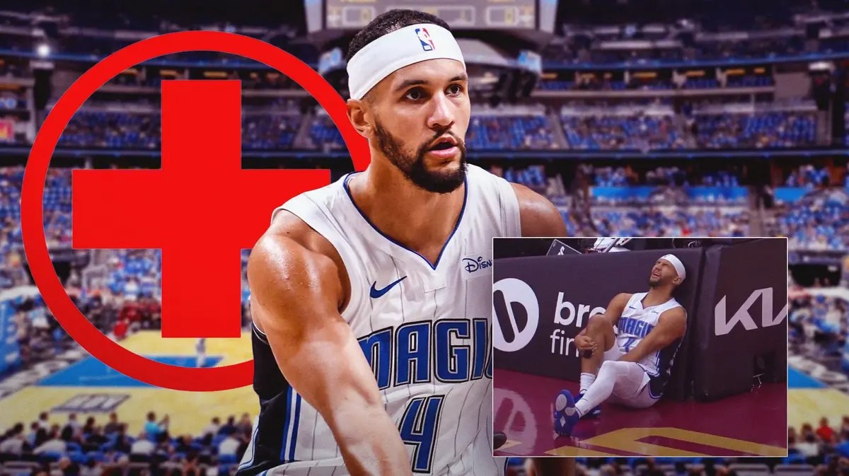 Jalen Suggs (Magic) with medical cross symbol