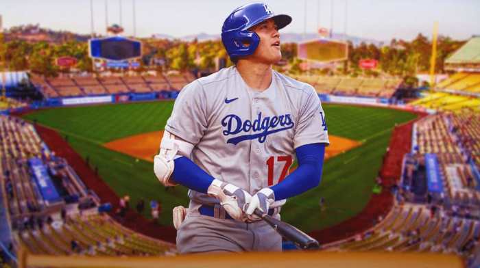 Shohei Ohtani in a Dodgers uniform swinging a baseball bat at Dodger Stadium