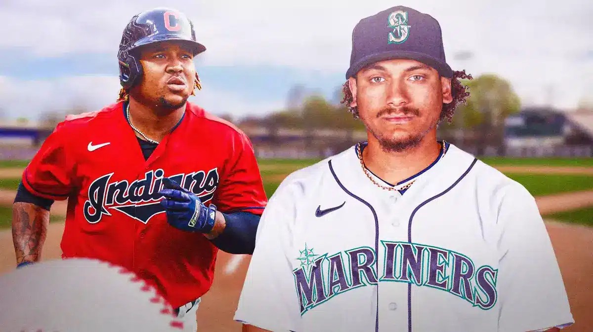 Josh Naylor in a Mariners uniform. Guardians' Jose Ramirez next to him looking serious.