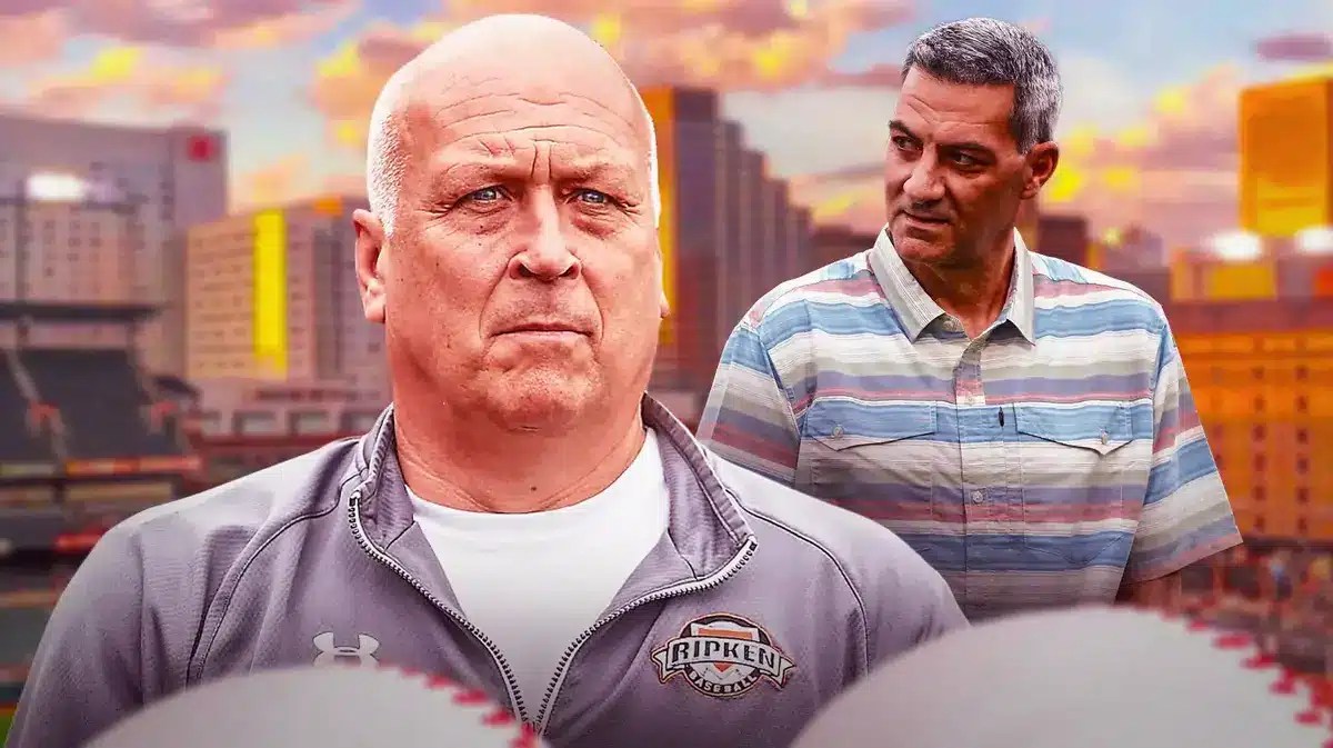 Cal Ripken Jr. and Ryan Minor together looking serious.