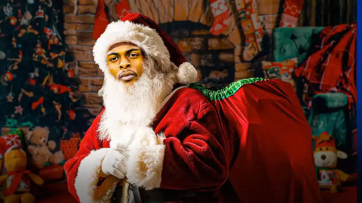 Raiders' Davante Adams as Santa Claus carrying lots of gifts