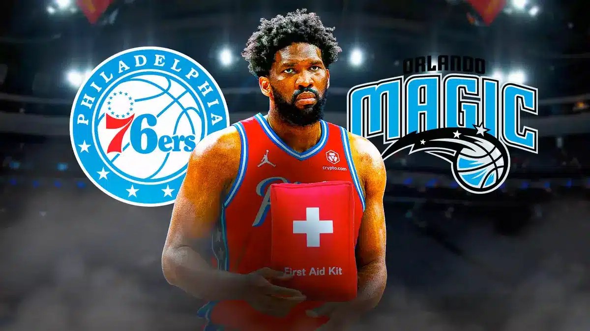 Joel Embiid with red medical box and Sixers/Magic logos behind him