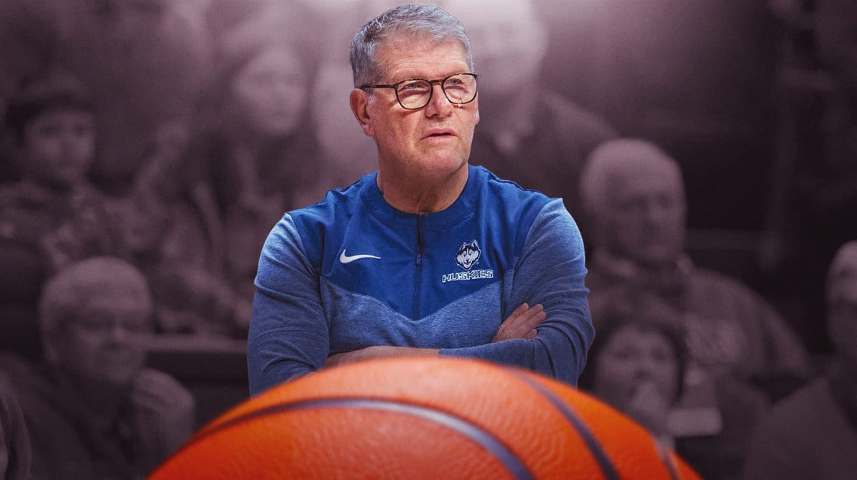 UConn women’s basketball coach Geno Aueriemma with the tear drop emojis on his face looking sad