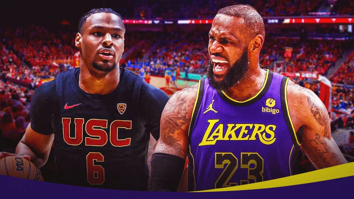 Bronny James in his USC jersey alongside LeBron James looking hyped