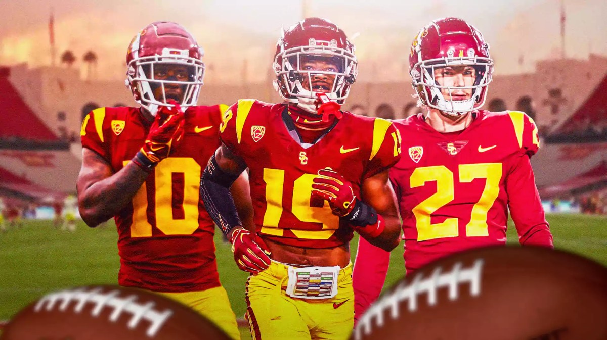 USC football, Bryson Shaw, Jaylin Smith, Jamil Muhammad, D'Anton Lynn, Bryson Shaw, Jaylin Smith and Jamil Muhammad all in USC unis with USC football stadium in the background