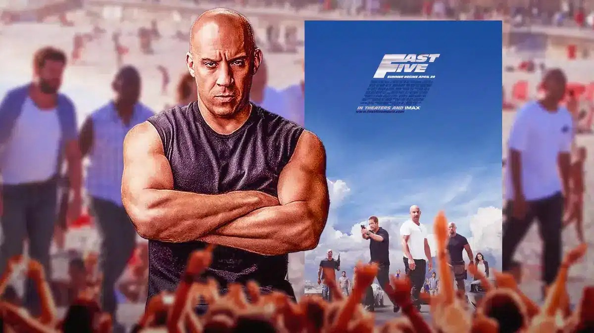 Vin Diesel next to Fast & Furious Fast Five poster.