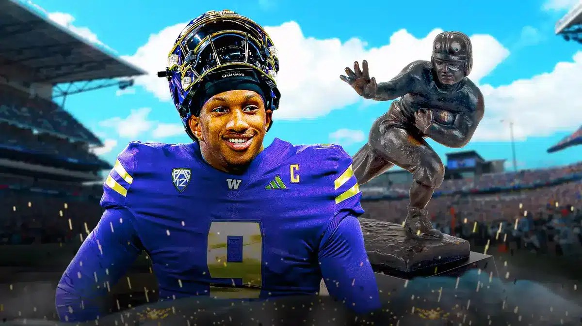 Washington football's Michael Penix Jr. next to the Heisman trophy