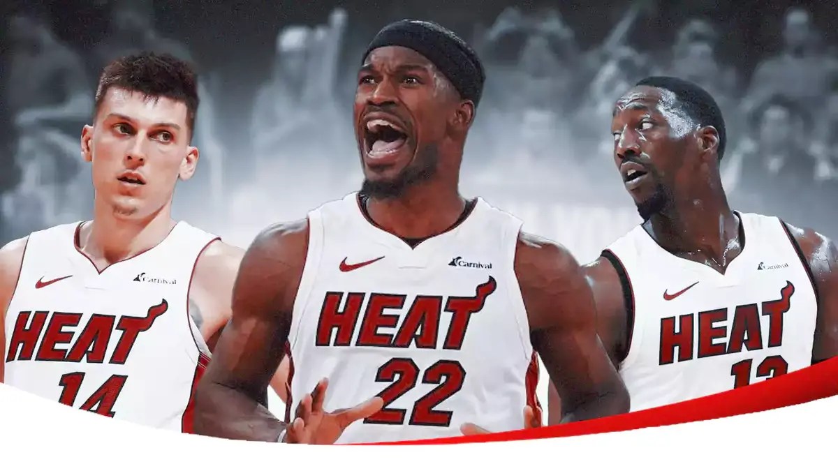 Miami Heat stars Jimmy Butler, Tyler Herro, and Bam Adebayo in front of the Kaseya Center.