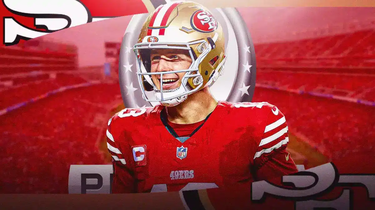 San Francisco 49ers quarterback Brock Purdy smiling with Pro Bowl logo at the back