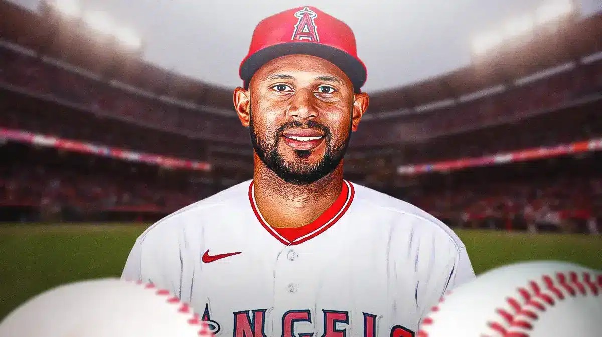 Aaron Hicks in an Angels uniform. Angels stadium in background