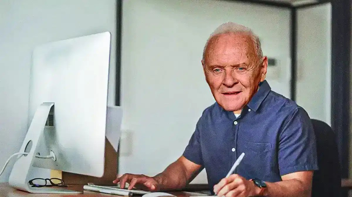 Anthony Hopkins at a computer writing.