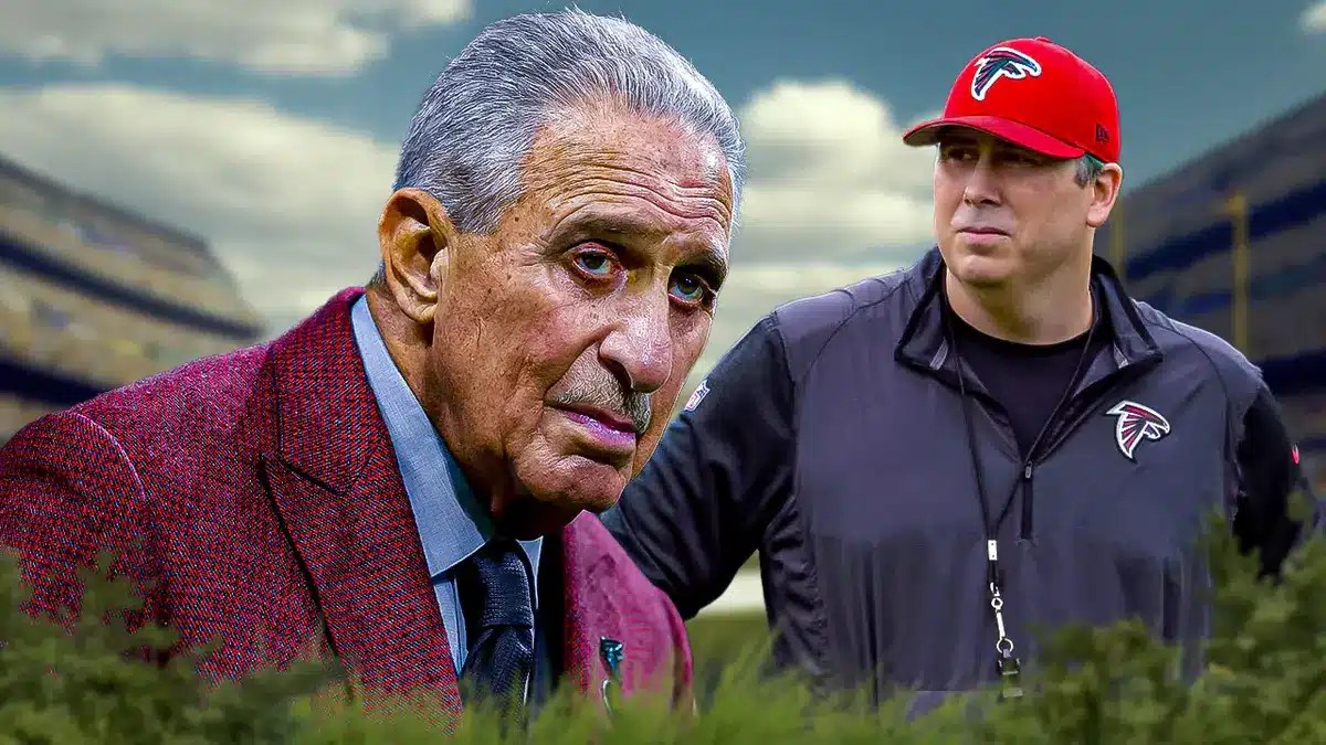 Atlanta Falcons owner Arthur Blank on the left beside former Falcons coach Arthur Smith with sad/concerned face