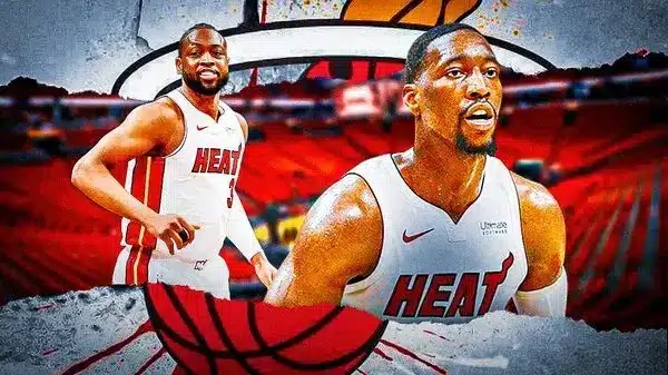 Miami Heat's Bam Adebayo and former player Dwayne Wade in front of the Kaseya Center.