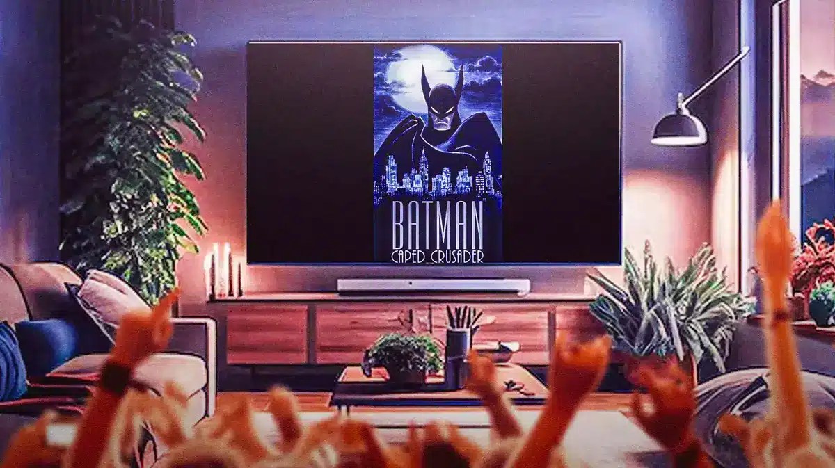 Batman: Caped Crusader poster on TV with living room background.