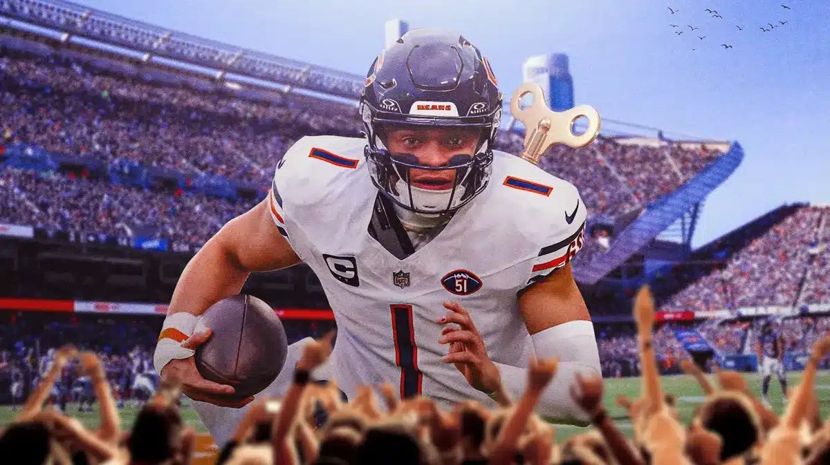 ACTION SHOT of Justin Fields (Bears) with a wind-up key inserted to his back. Caleb Williams, NFL Draft