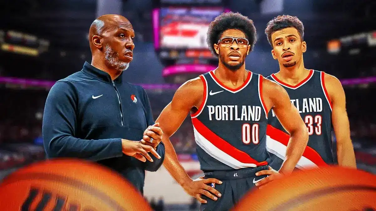 Blazers coach Chauncey Billups standing with Scoot Henderson and Toumani Camara