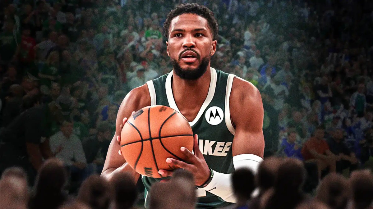 Malik Beasley with the Bucks arena in the background