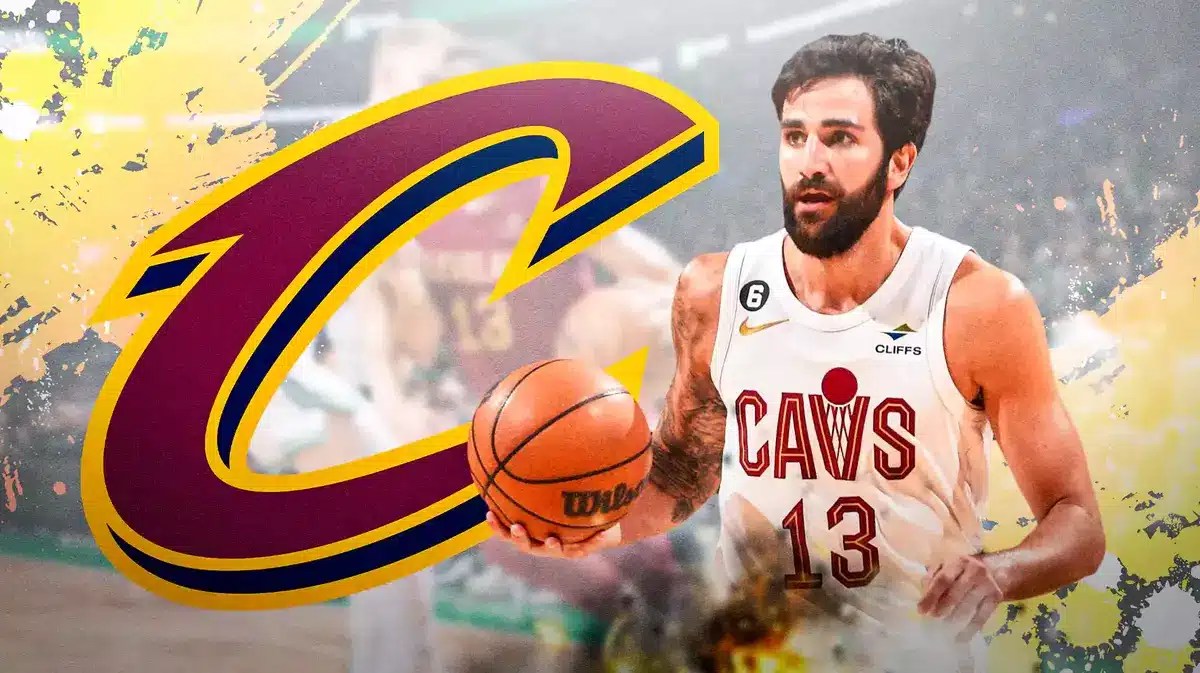 Ricky Rubio next to Cavs logo
