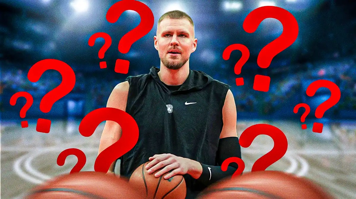 Celtics forward Kristaps Porzingis with question marks around him.