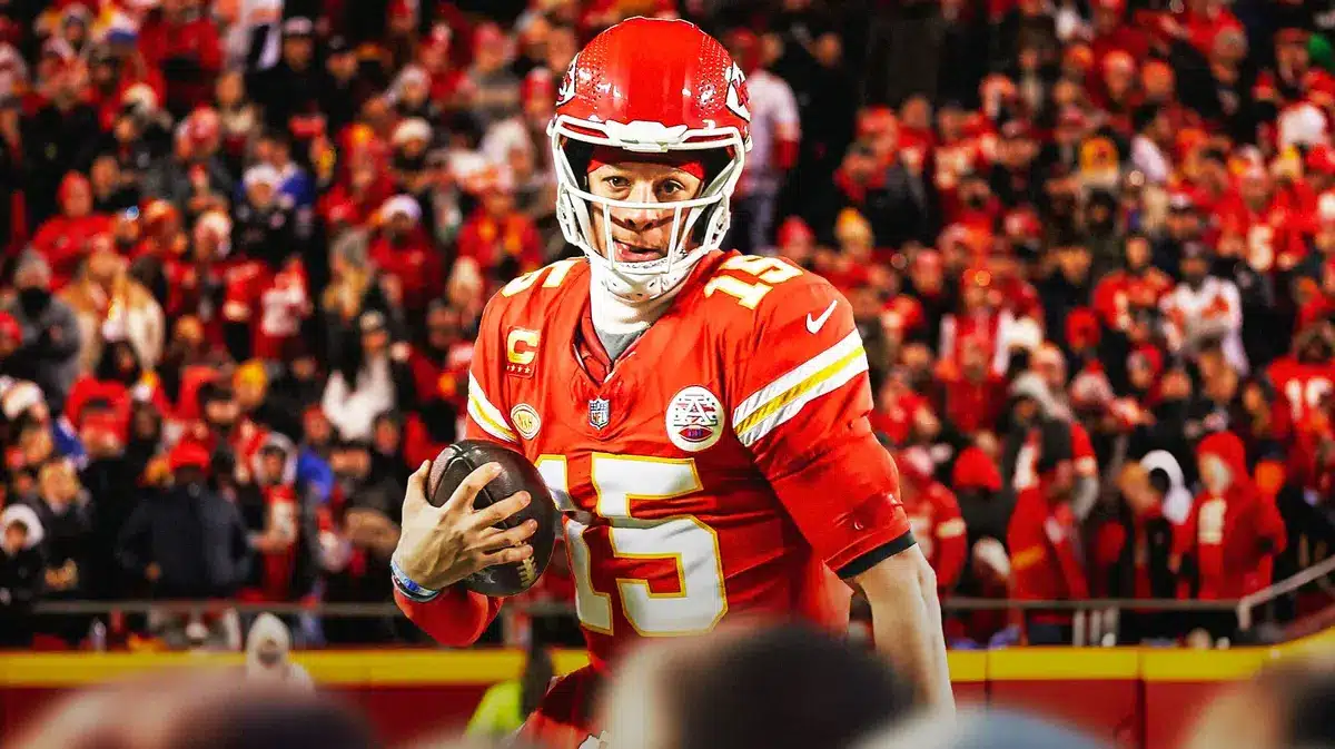 Kansas City Chiefs quarterback Patrick Mahomes in front with serious face