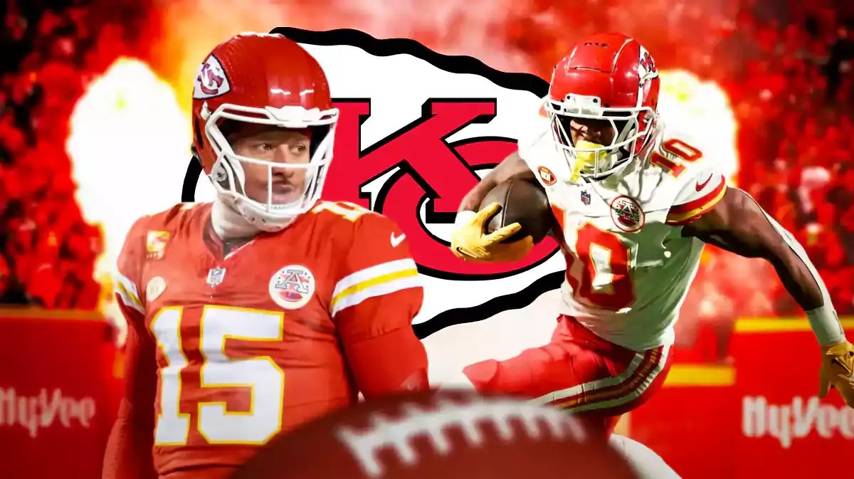 Chiefs' Isiah Pacheco running with a football. Chiefs' Patrick Mahomes looking at Pacheco. Chiefs' logo in background.