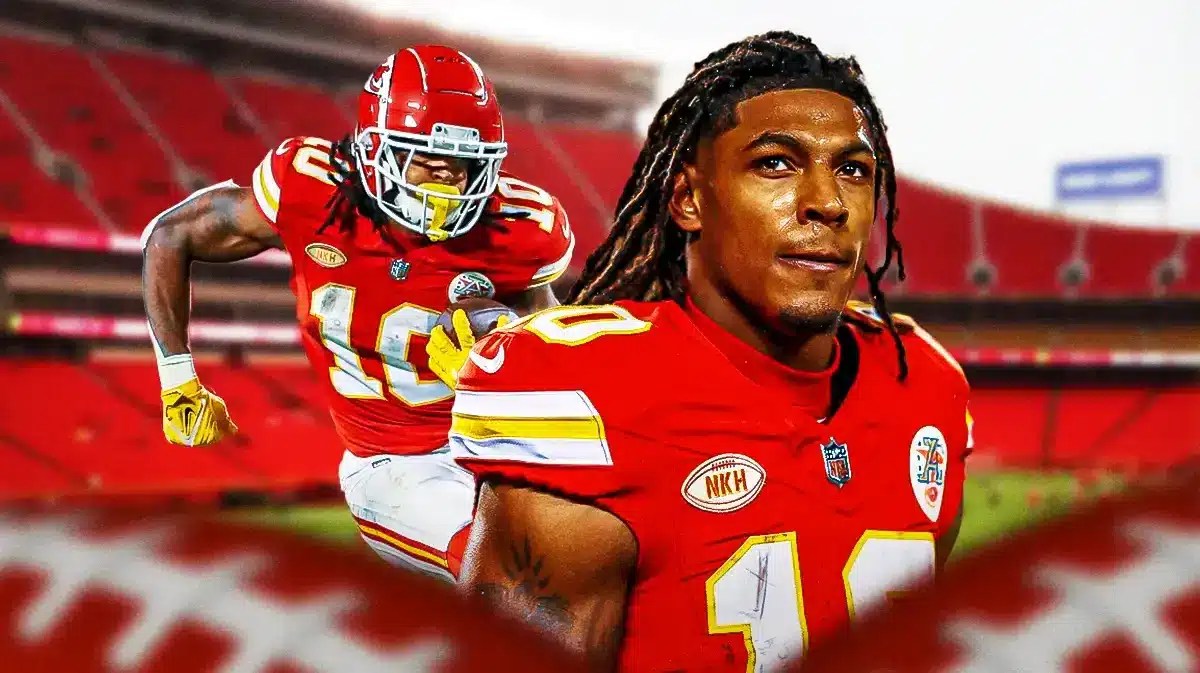 Chiefs' Isiah Pacheco looking serious and sitting down on an NFL sideline.