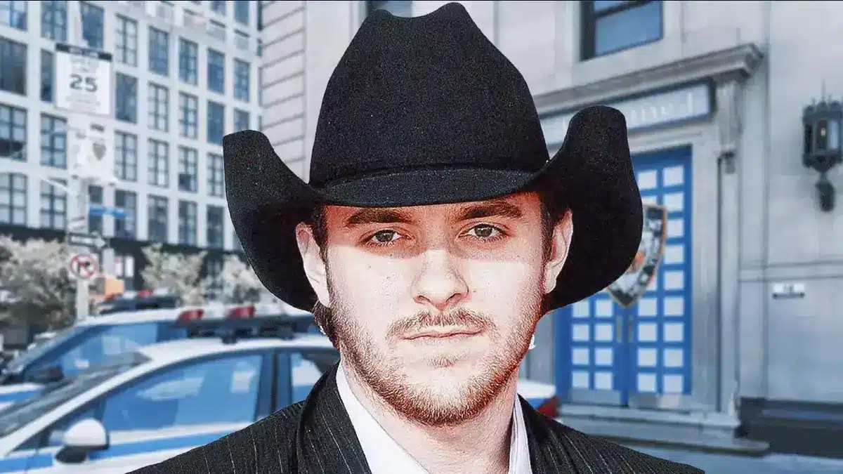 Chris Young in front of a police station.