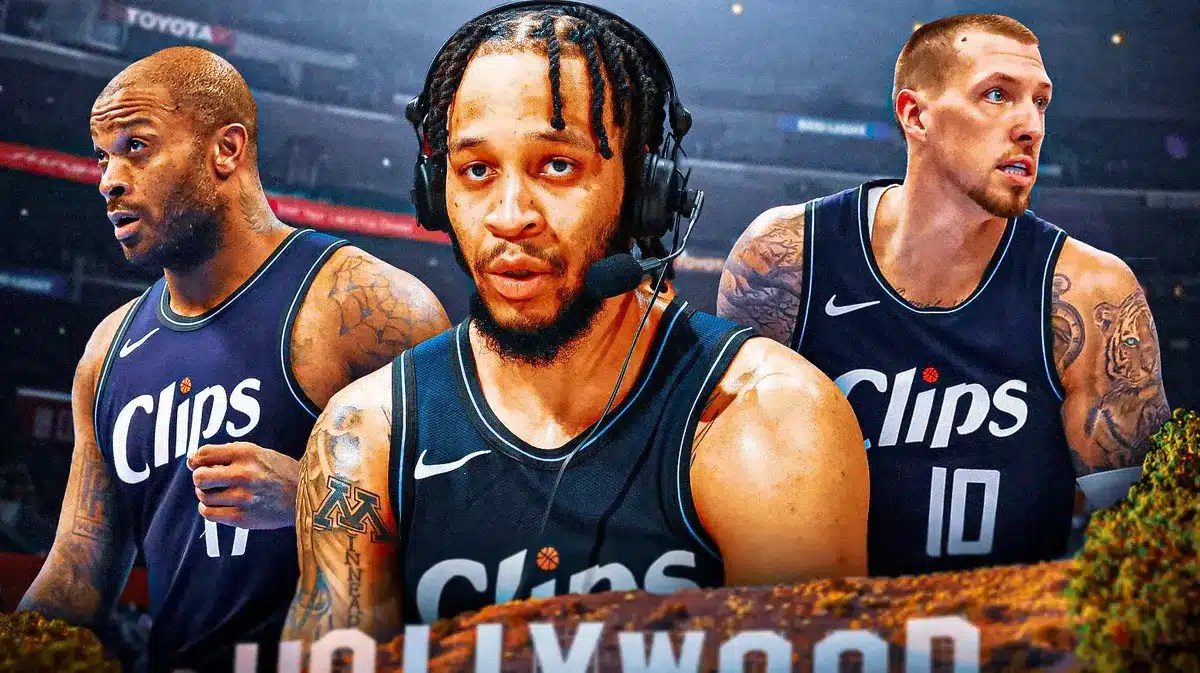 Clippers' Daniel Theis, PJ Tucker, and Amir Coffey looking on