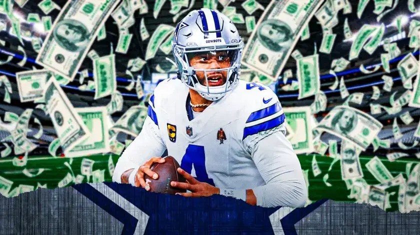 Cowboys' Dak Prescott with money falling down around him.