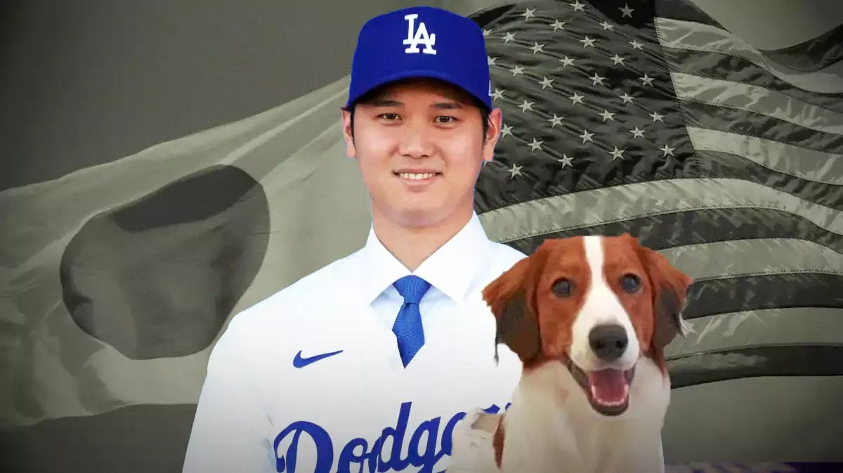 Dodgers' Shohei Ohtani with his dog, with the US and Japan flags beside them