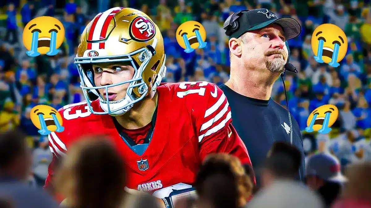 Dan Campbell, Brock Purdy. Lions fans in background. crying emojis all around