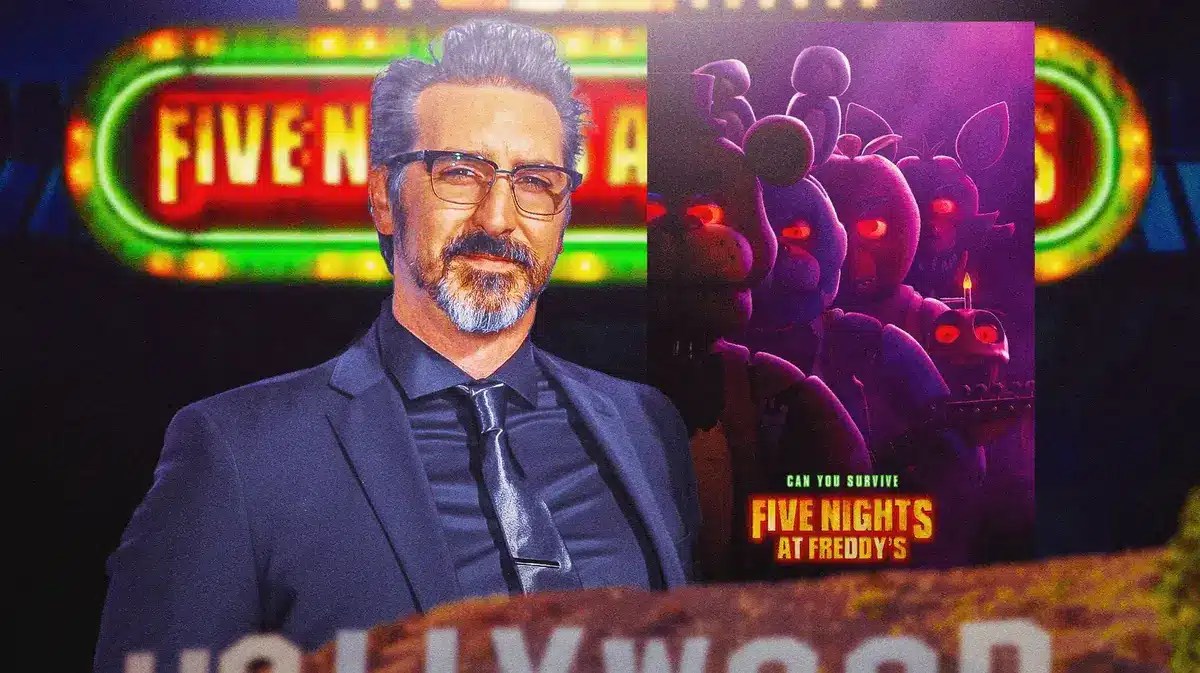 Ryan Turek with a Five Nights at Freddy's poster.