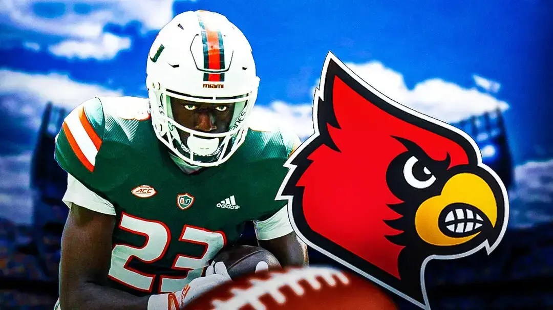 Photo: Jaleel Skinner with Louisville logo behind him
