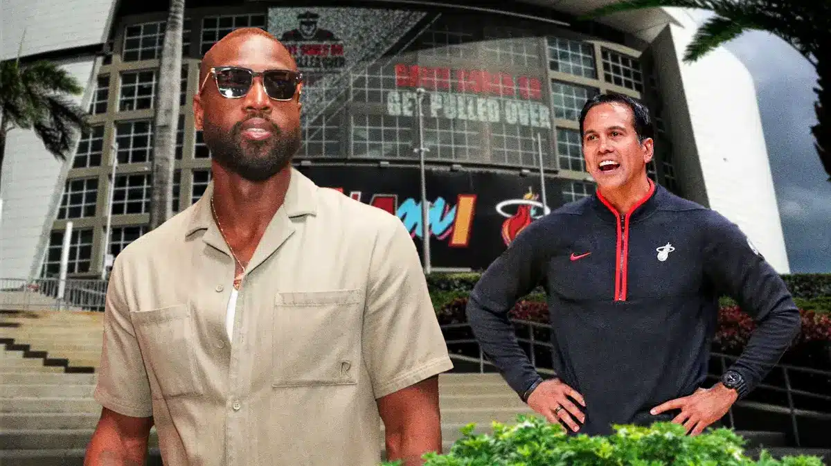 Miami Heat head coach Erik Spoelstra and former player Dwyane Wade in front of the Kaseya Center.