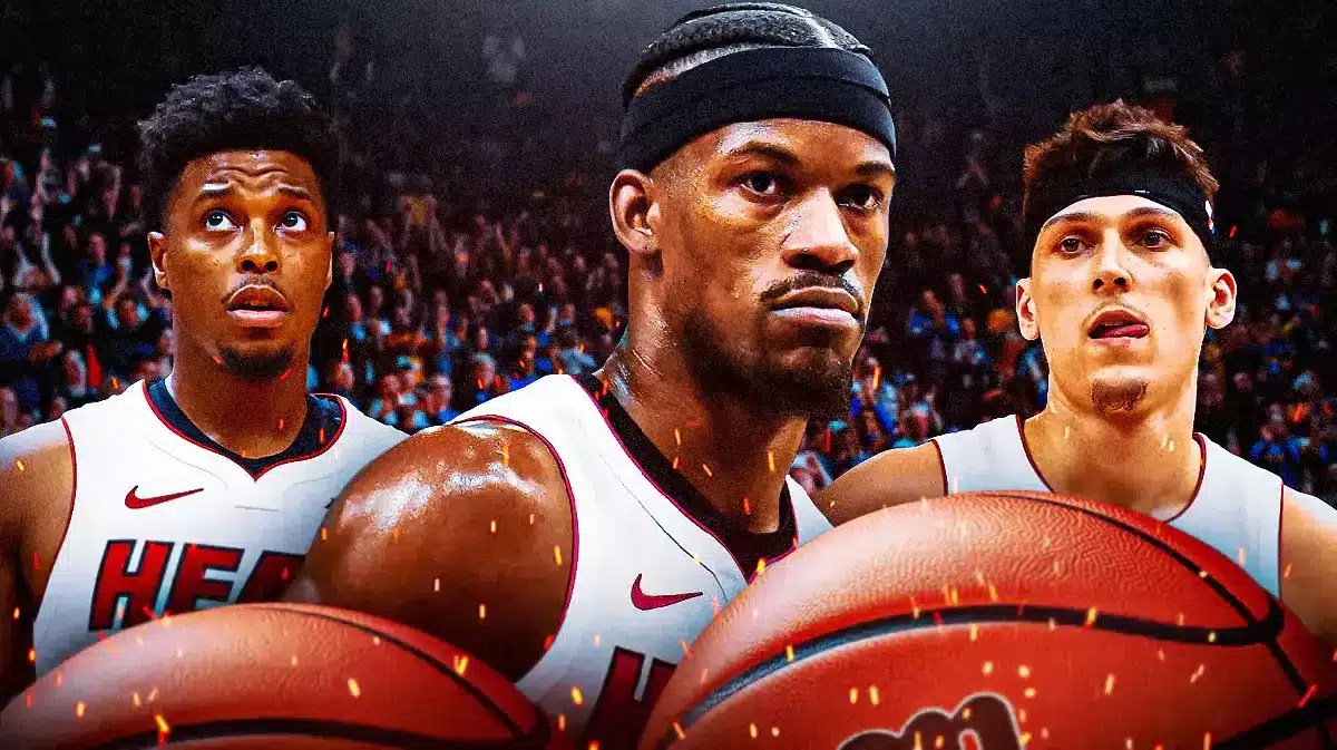 Miami Heat stars Jimmy Butler, Tyler Herro, and Kyle Lowry in front of the Kaseya Center in front of the Kaseya Center.