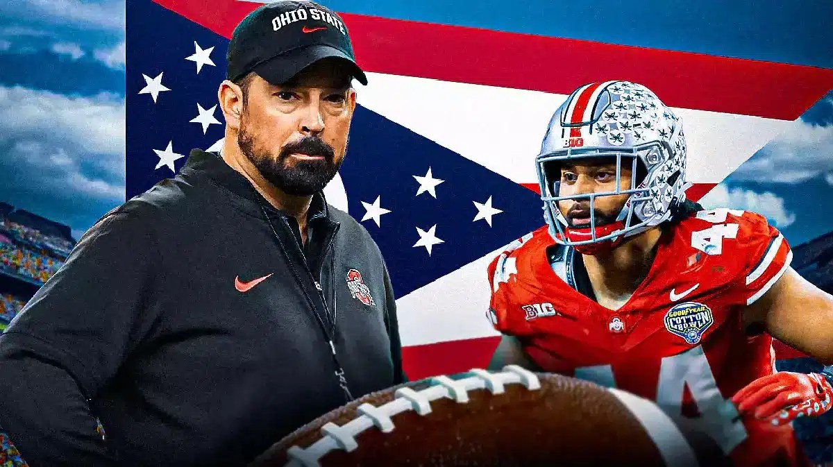 Photo: JT Tuimoloau in Ohio State jersey with Rya Day in Ohio State gear and Ohio State flag with fans in the back