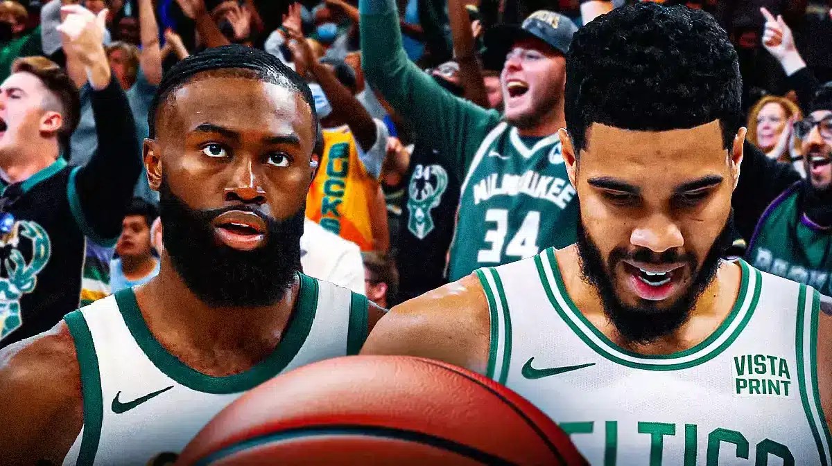 Photo: Jaylen Brown and Jayson Tatum (sad) on the bench with bucks fans behind them