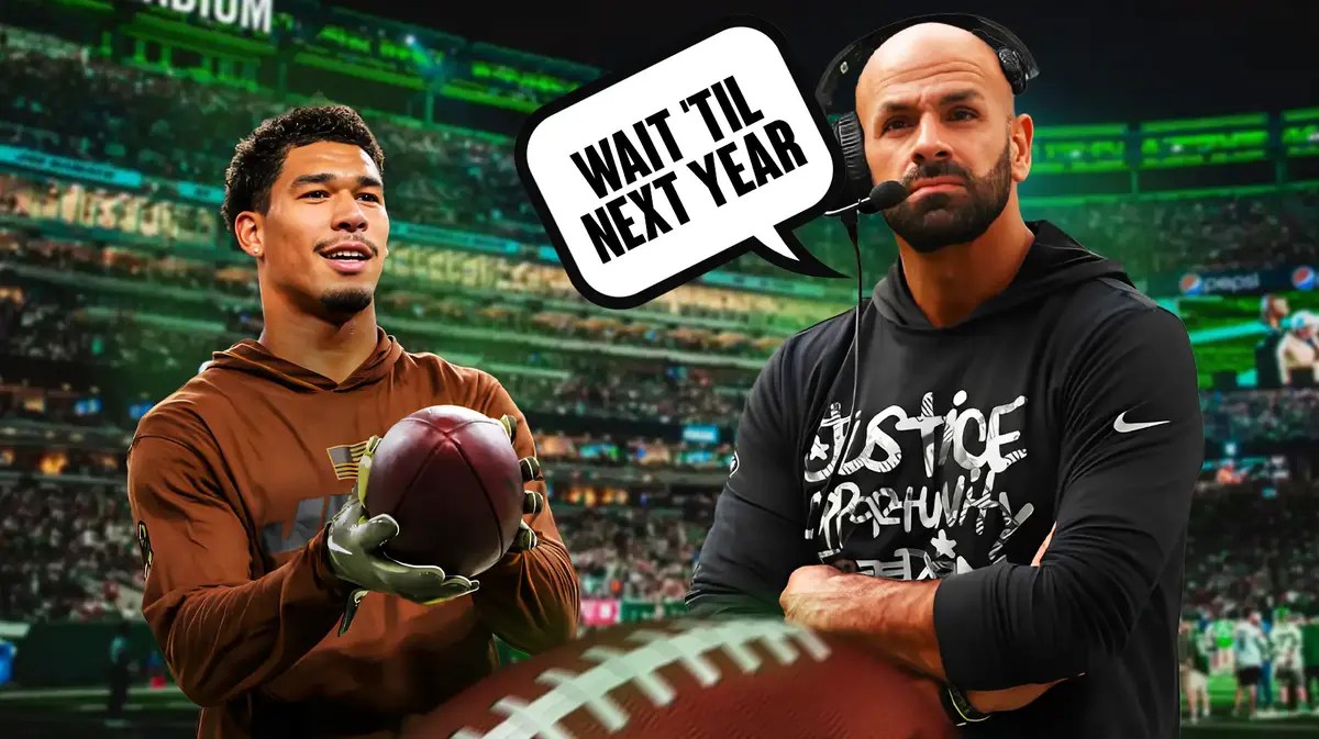 Robert Saleh saying “Wait 'til next year” looking at Allen Lazard in sweatsuit.