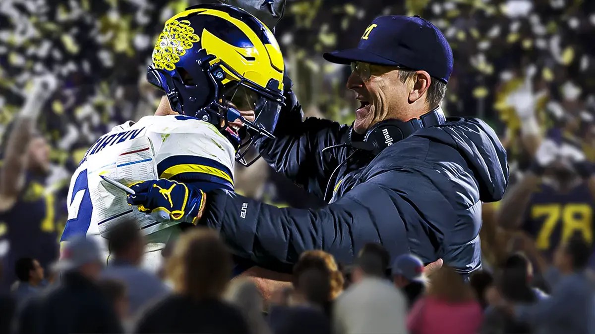 Michigan football coach Jim Harbaugh and JJ McCarthy