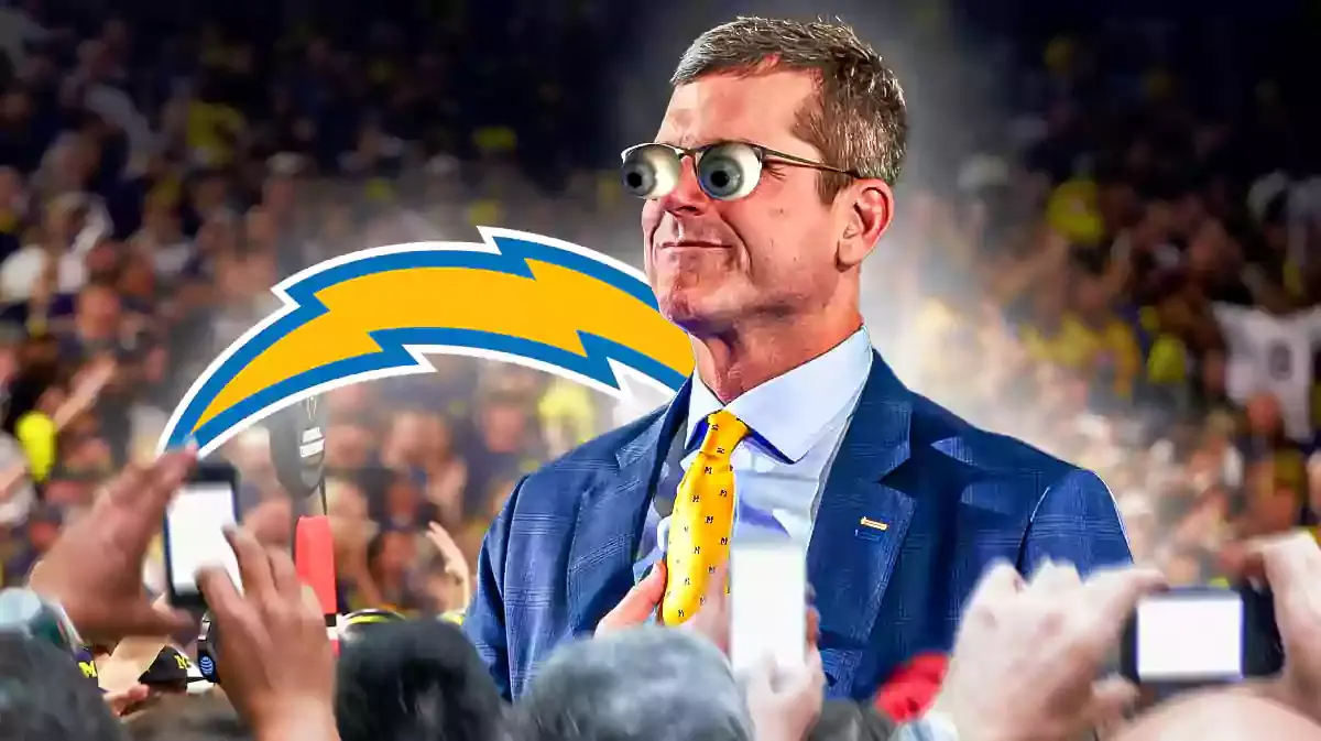 Michigan football’s Jim Harbaugh with eyes popping out looking at the LA Chargers' logo.