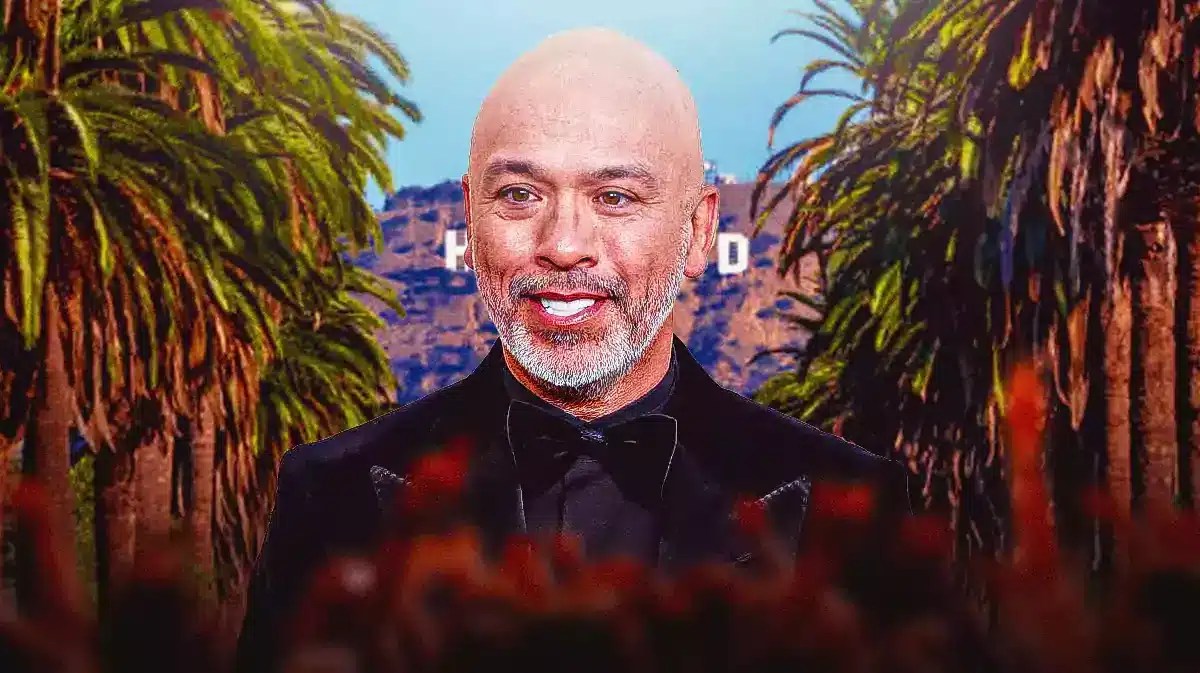 Jo Koy with Hollywood sign behind him.