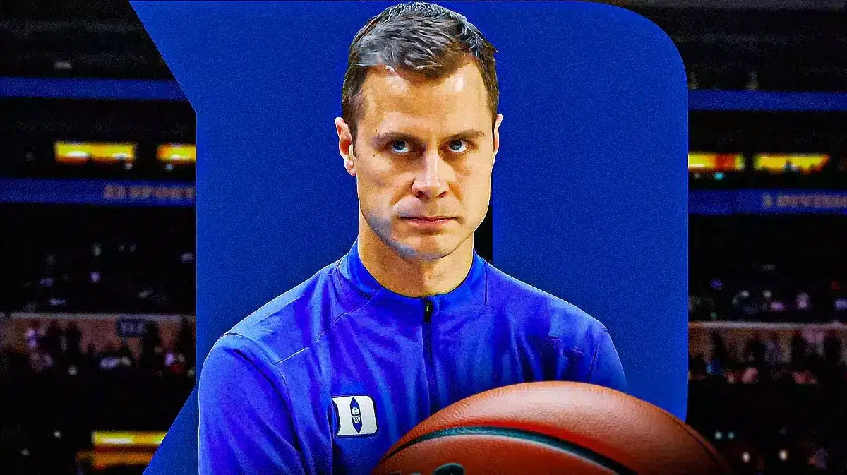 Duke basketball head coach Jon Scheyer in front of Cameron Indoor Stadium.