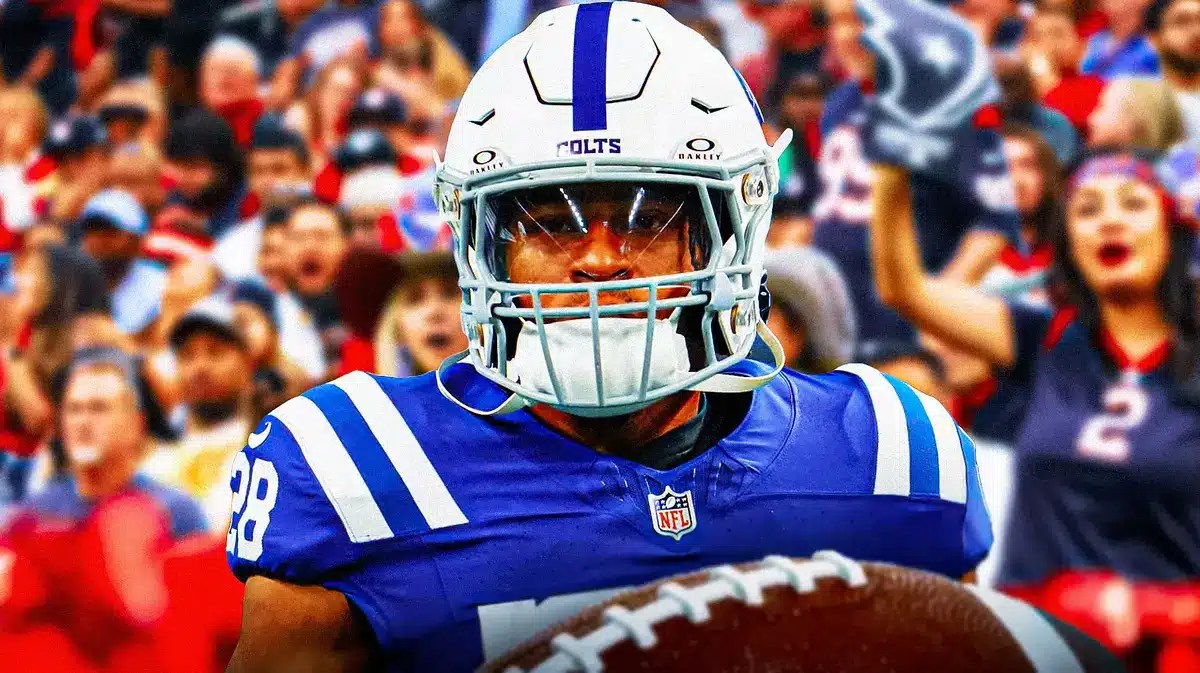 Photo: Jonathan Taylor in Colts uniform, with Texans fans/players around him celebrating.