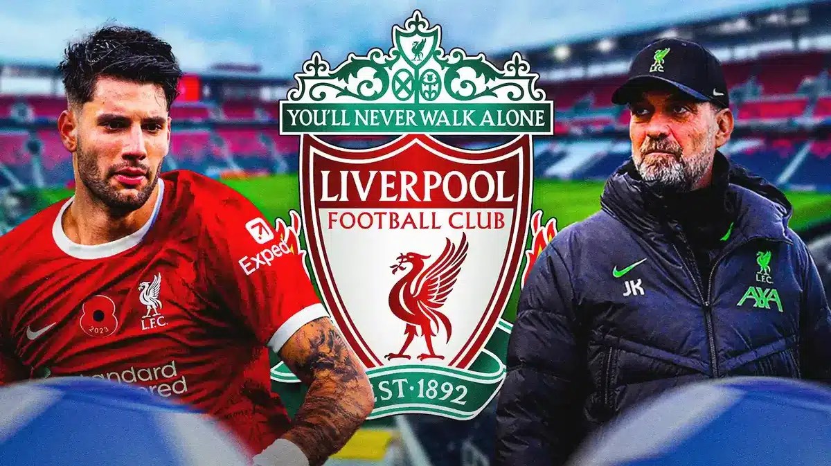 Dominik Szoboszlai and Jurgen Klopp in front of the Liverpool logo