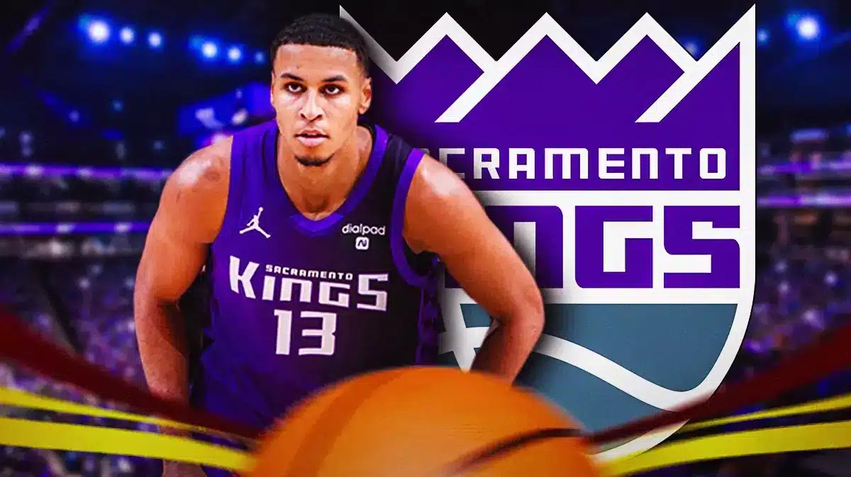 Kings' Keegan Murray looking serious. Kings' logo in background.